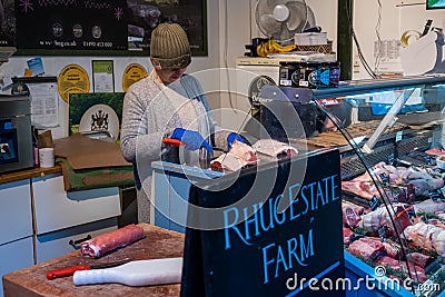 Butcher at work in a stall Editorial Stock Photo