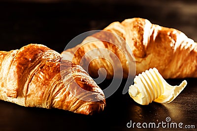Butter and Croissant Bread on Top of a Table Stock Photo