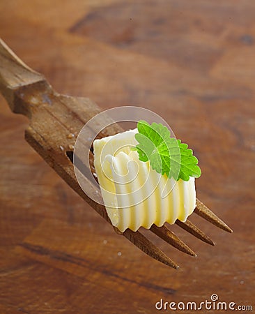 Butter curl garnished with mint Stock Photo