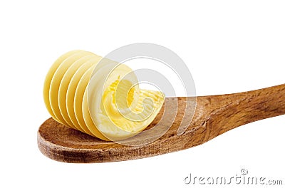 Butter curl on a wooden spoon Stock Photo