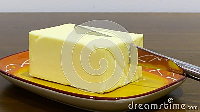 Butter with knife Stock Photo