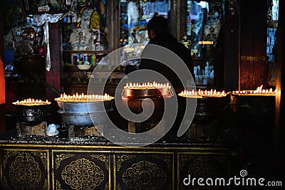 Butter lamps with flames Editorial Stock Photo