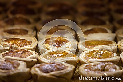 Butter tarts, small size, for sale on the shelf of a Canadian Market of Toronto. Butter tart is symbol of canadian cuisine Stock Photo