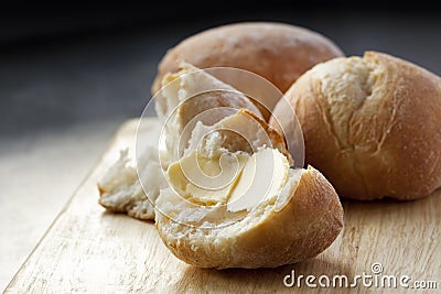 Buttered Bread Roll Stock Photo
