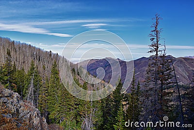 Butterfield Peak views of Oquirrh range toward Provo, Tooele, Utah Lake and Salt Lake County by Rio Tinto Bingham Copper Mine, in Stock Photo