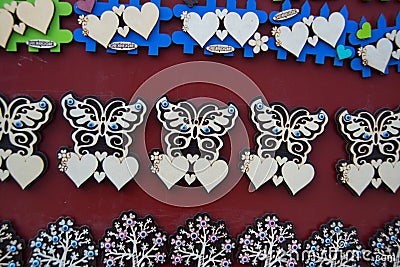 Butterfly and hearts. Beautiful handmade Souvenirs made of wood, traditional Turkish market. Bazaar, Turkey, Eskisehir Stock Photo