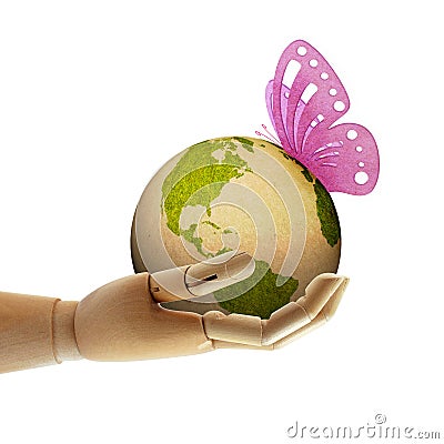 Butterfly land on paper earth Stock Photo