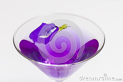 Butterfly pea flower juice in cocktail glass that is qualify as an antioxidant with clipping path Stock Photo