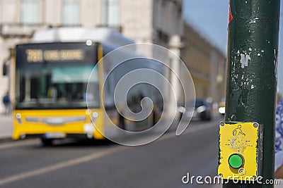 button for activating the green light to give way to pedestrians crossing the road. Stock Photo