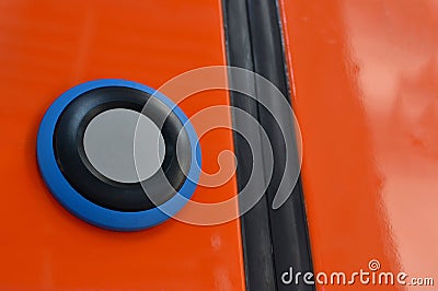 Button with sign wheelchair. Train door push button press to open sliding mechanical door at a train station platform. Special Stock Photo