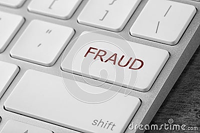 Button with word FRAUD on keyboard, closeup view Stock Photo