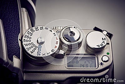 Buttons and shutter control dial on SLR camera Stock Photo