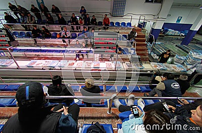 Buyers bidding for fish captures on a fish market Editorial Stock Photo