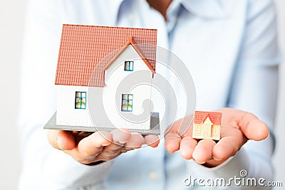 Buying a small or a big house considering the prices difference Stock Photo