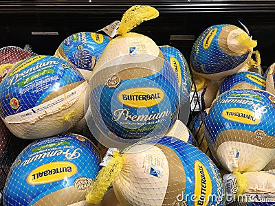 Buying A Turkey In A Supermarket for Thanksgiving. Editorial Stock Photo