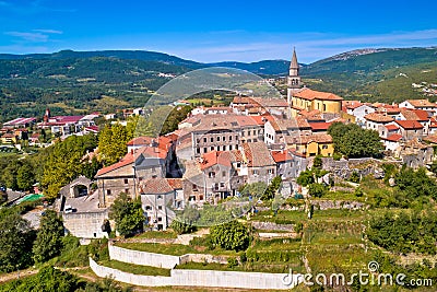 Buzet. Idyllic hill town of Buzet in green landscape aerial view Stock Photo