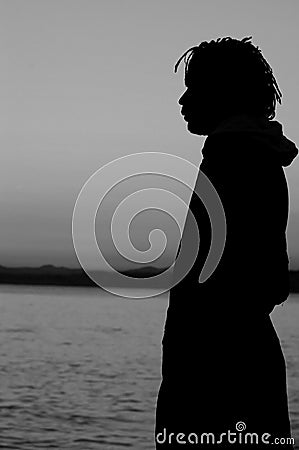 BW Profile of a man on seafront Stock Photo