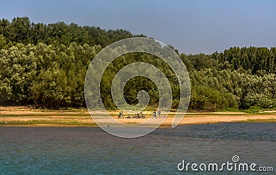 Bycicles on the Danube's beach, Romania Stock Photo