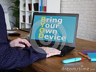 BYOD bring your own device is shown on the photo using the text Stock Photo