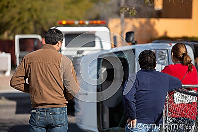 Bystanders at Crash Scene on street Editorial Stock Photo