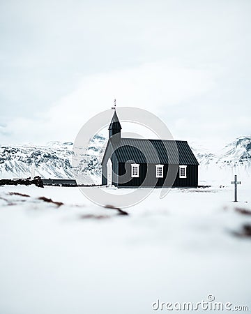 BÃºÃ°akirkja, SnÃ¦fellsnes Peninsula, Iceland, Black church surrounded by snow, frozen nature Stock Photo