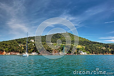 White Yacht in the sea near the island. Stock Photo