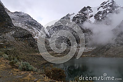 Cabana de laguna Cancaraga located on Ruta 107 on the way to Tunel Punta Olimpica with Cordillera Blanca snow capped mountain Stock Photo