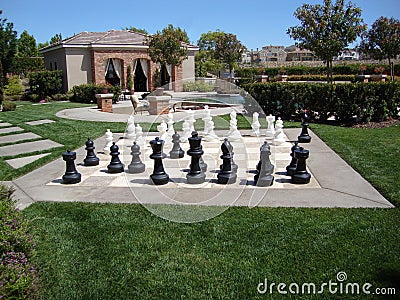 Cabana, Swimming Pool and Chess Game Stock Photo