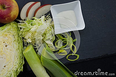 Cabbage, apple and leek salad with mayonaise Stock Photo