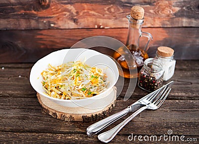 Cabbage salad on an old wooden background Stock Photo