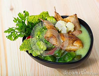 Cabbage soup with quails and greens Stock Photo