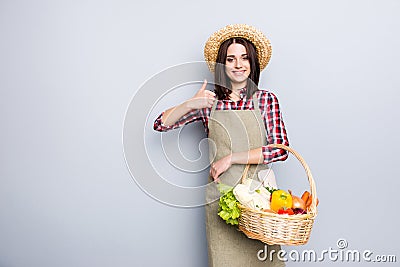 Cabbage vegan vegetarian hay straw domestic pepper paprika carrot lettuce checkered shirt people concept. Satisfied gardener Stock Photo