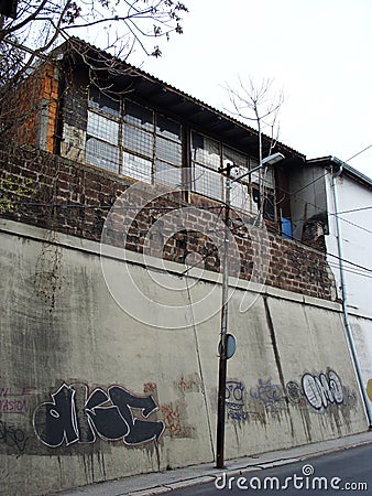 Cabin above the concrete wall Stock Photo