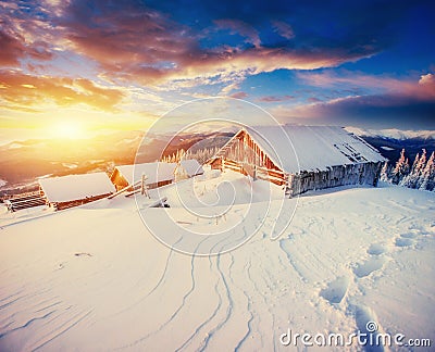 Cabin in the mountains in winter Stock Photo