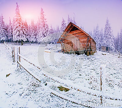 Cabin in the mountains in winter Stock Photo