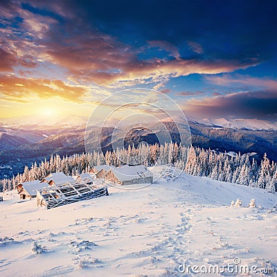 Cabin in the mountains in winter Stock Photo