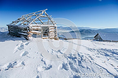 Cabin in the mountains in winter Stock Photo