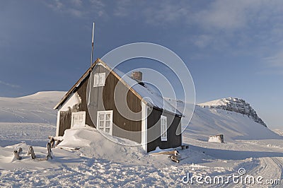 Cabin of wood in the middle of a paradise frozen - 2 Stock Photo