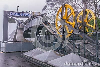 Cable car lifting gear wheel, the power of conveyers to mountain Editorial Stock Photo