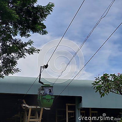 cable car line leading to the departure station, in the beautiful Indonesian mini park area Editorial Stock Photo