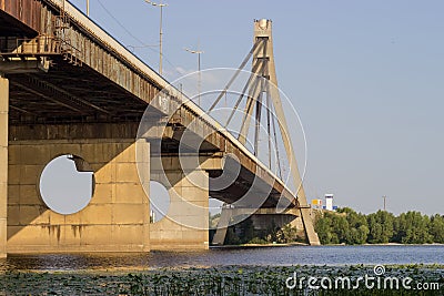 Cable-stayed bridge across wide river, bottom view Stock Photo