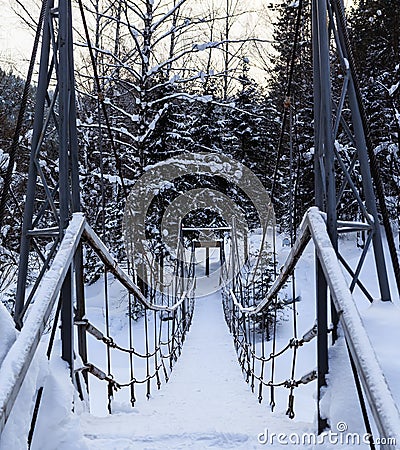 Cable suspension Bridge over Belokurikha river Stock Photo