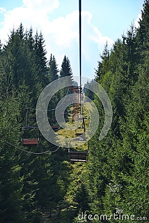 Climb in the chairlift form Vatra Dorneu, Romania Stock Photo