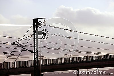 Cables and pole tower electric train railway Stock Photo