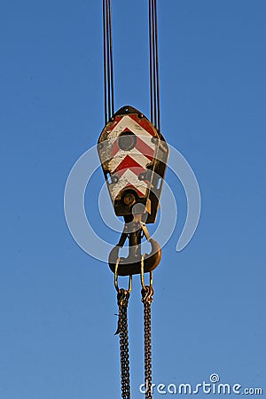 Cables and pulleys of a sky crane extended against the sky Stock Photo