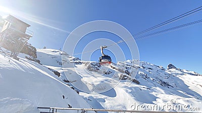 The cableway to mount Titlis over Engelberg on the Swiss alps Editorial Stock Photo