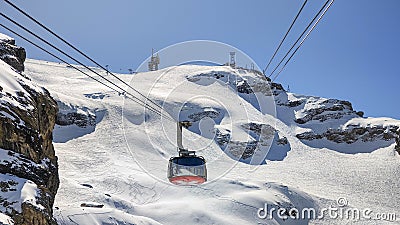 The cableway to mount Titlis over Engelberg on the Swiss alps Editorial Stock Photo