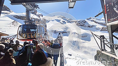 The cableway to mount Titlis over Engelberg on the Swiss alps Editorial Stock Photo