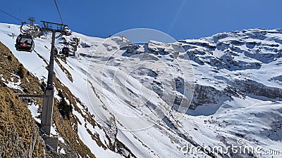 The cableway to mount Titlis over Engelberg on the Swiss alps Editorial Stock Photo