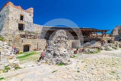 Cachtice, Slovakia - 4.7.2020: Tourists are visiting ruin of medieval castle Cachtice. Famous castle known from legend about blood Editorial Stock Photo